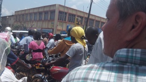 Traveling downtown Kampala by motorcycle taxi (Boda-boda)